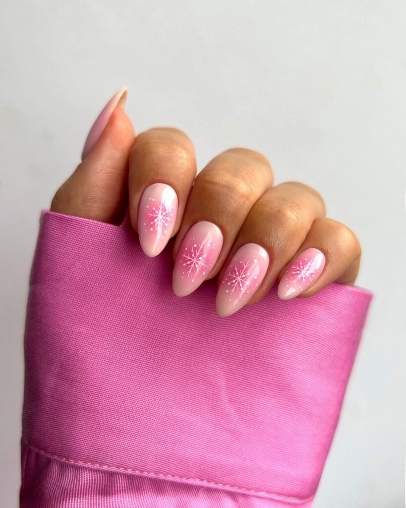 Pink Snowflakes: A Soft and Festive Christmas Nail Design